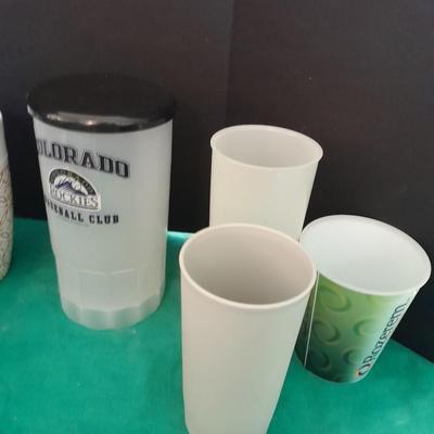 Assortment of plastic kitchen cups, and beverage coozie's