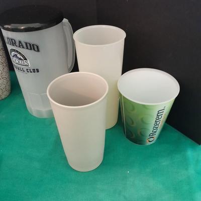 Assortment of plastic kitchen cups, and beverage coozie's