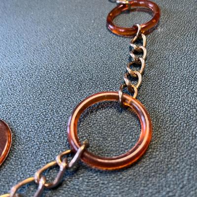VINTAGE BELT RING AND CHAIN AMBER PLASTIC RINGS