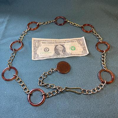 VINTAGE BELT RING AND CHAIN AMBER PLASTIC RINGS