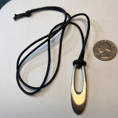 SIMPLE MODERN OVAL HOOP PENDANT ON 28â€ ROPE