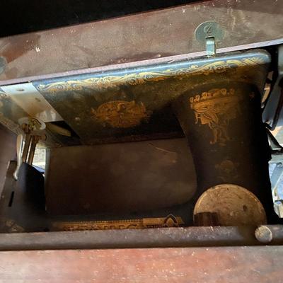 Singer Sewing Machine in Cabinet