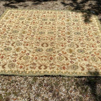 Hand woven/braded area rug