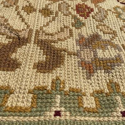 Hand woven/braded area rug