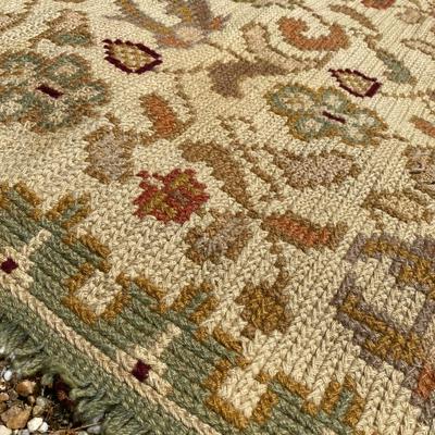 Hand woven/braded area rug