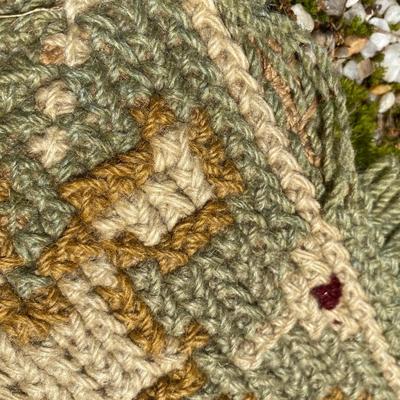 Hand woven/braded area rug