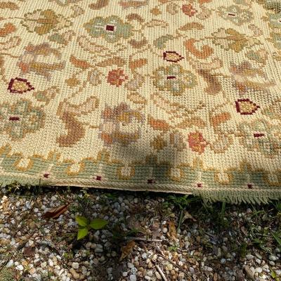 Hand woven/braded area rug