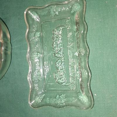 Two French light shades or vases with Glasbake apple dishes and a small dish with the last supper