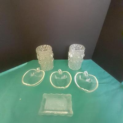 Two French light shades or vases with Glasbake apple dishes and a small dish with the last supper