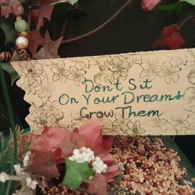 Gardening pots, glass bulb waterers, vase and a springtime chair decoration
