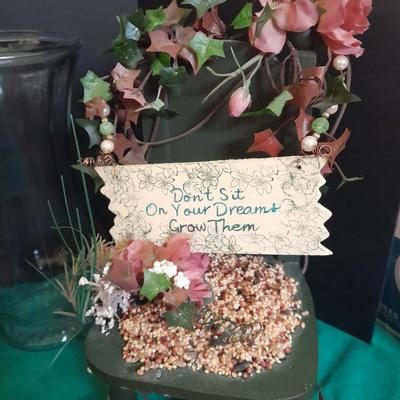 Gardening pots, glass bulb waterers, vase and a springtime chair decoration