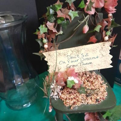 Gardening pots, glass bulb waterers, vase and a springtime chair decoration