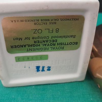 Men's Royal Regiment sandalwood cologne in decanter, brass dish, and Dale Jr. playing cards