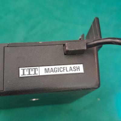 Vintage Polaroid sx-70 Land Camera with flash bulb and original instruction books