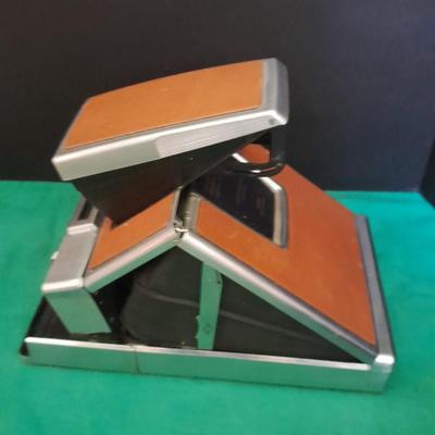 Vintage Polaroid sx-70 Land Camera with flash bulb and original instruction books