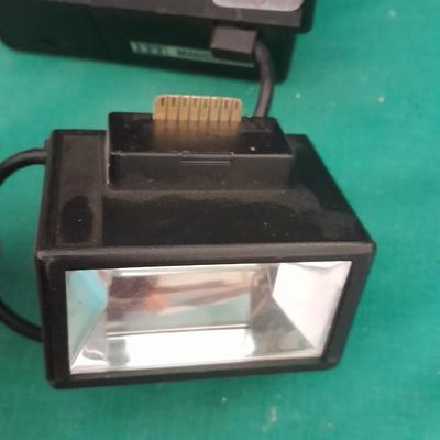 Vintage Polaroid sx-70 Land Camera with flash bulb and original instruction books