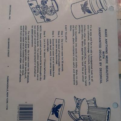 Plastic file storage box full of transfers, some vintage hard to find transfers!