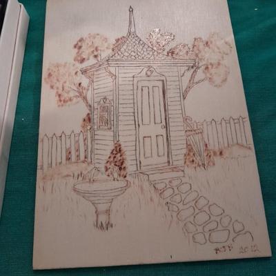 Artist Painting supplies including face painting brushes, Dymo label maker and lidded containers for beads and more