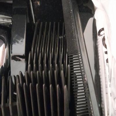 Like new Conair clippers and several make-up / travel bags