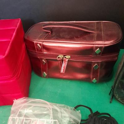 Like new Conair clippers and several make-up / travel bags