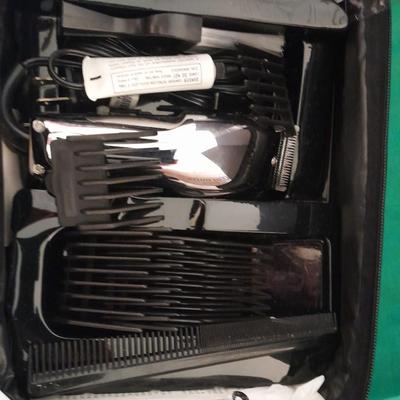 Like new Conair clippers and several make-up / travel bags