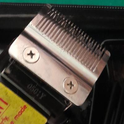 Like new Conair clippers and several make-up / travel bags