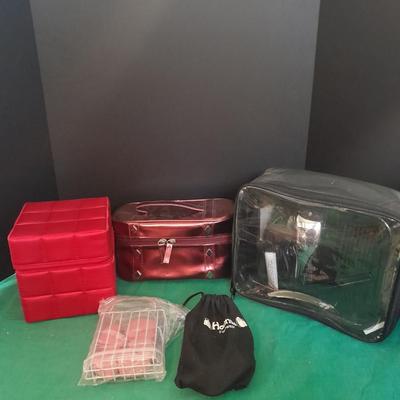 Like new Conair clippers and several make-up / travel bags