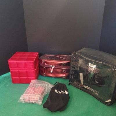 Like new Conair clippers and several make-up / travel bags