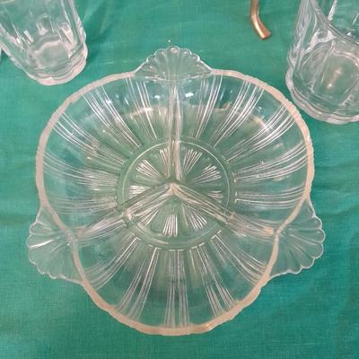 Set of 8 drinking glasses, a candle vase, and a treat dish