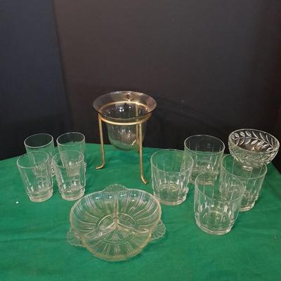 Set of 8 drinking glasses, a candle vase, and a treat dish