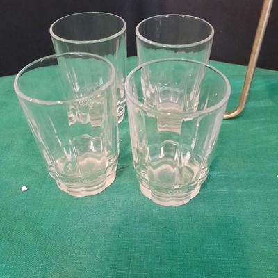 Set of 8 drinking glasses, a candle vase, and a treat dish