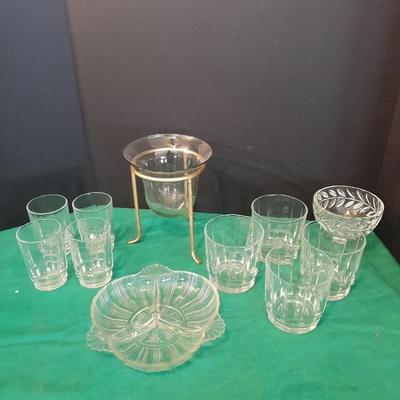 Set of 8 drinking glasses, a candle vase, and a treat dish