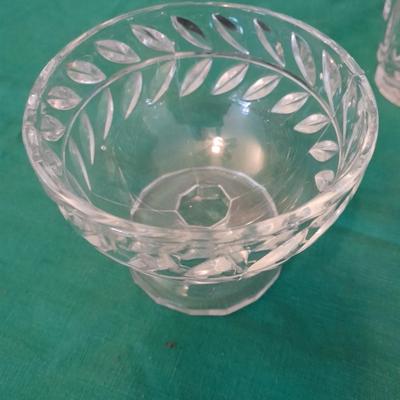 Set of 8 drinking glasses, a candle vase, and a treat dish
