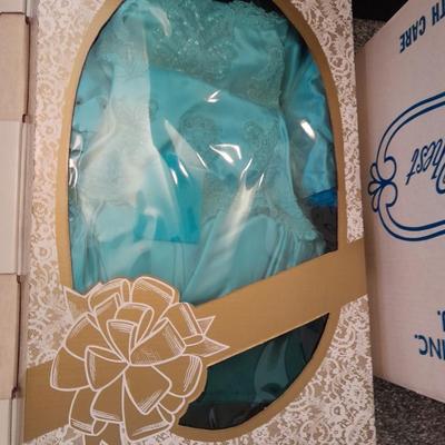 Beautiful, elegant wedding gown size 18 in cardboard storage chest