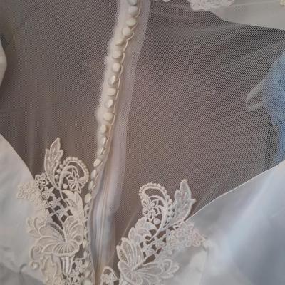 Beautiful, elegant wedding gown size 18 in cardboard storage chest