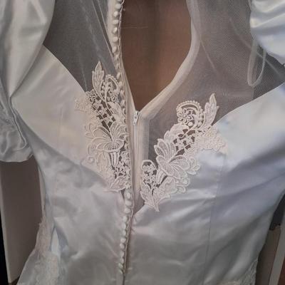 Beautiful, elegant wedding gown size 18 in cardboard storage chest