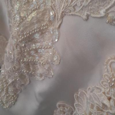 Beautiful, elegant wedding gown size 18 in cardboard storage chest