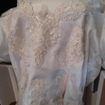 Beautiful, elegant wedding gown size 18 in cardboard storage chest