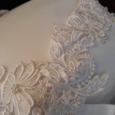 Beautiful, elegant wedding gown size 18 in cardboard storage chest