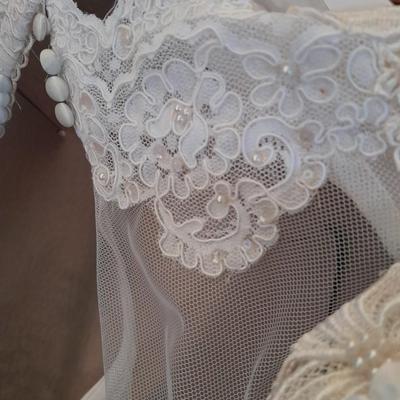 Beautiful, elegant wedding gown size 18 in cardboard storage chest