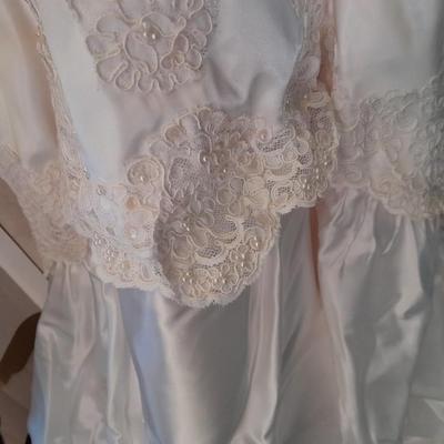 Beautiful, elegant wedding gown size 18 in cardboard storage chest