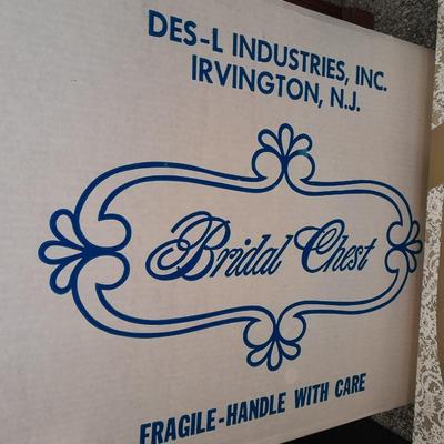 Beautiful, elegant wedding gown size 18 in cardboard storage chest