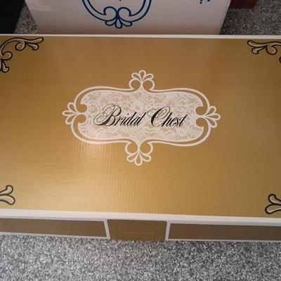 Beautiful, elegant wedding gown size 18 in cardboard storage chest