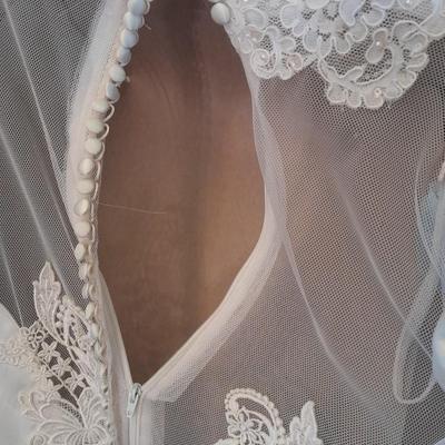 Beautiful, elegant wedding gown size 18 in cardboard storage chest