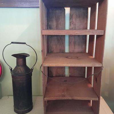 Divided wooden J.D. Martin California crate and tin vase with handle.