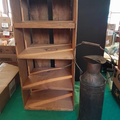 Divided wooden J.D. Martin California crate and tin vase with handle.