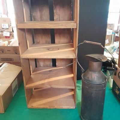 Divided wooden J.D. Martin California crate and tin vase with handle.