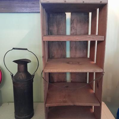 Divided wooden J.D. Martin California crate and tin vase with handle.