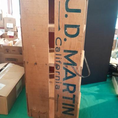 Divided wooden J.D. Martin California crate and tin vase with handle.