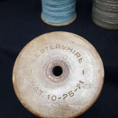 Wooden Bobbins with yarn